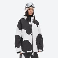 
                  
                    Women's waterproof 2L snow jacket and pants - cow print, on-model full-body front view, for powder days and winter commute
                  
                