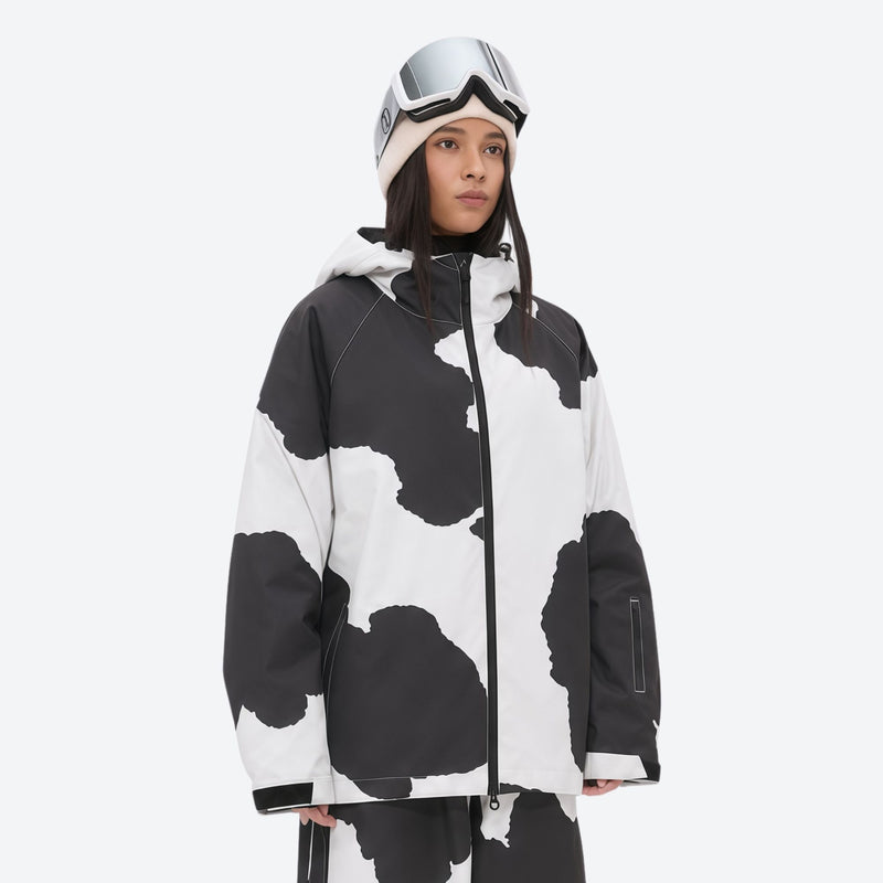 Women's waterproof 2L snow jacket and pants - cow print, on-model full-body front view, for powder days and winter commute