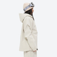 
                  
                    Women's 2-layer snowboard jacket and pants - cream, on-model hood side view, for resort and street wear
                  
                