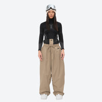 
                  
                    Women's 2-layer snowboard jacket and pants - tan snow pants, on-model front view, for powder days and winter commute
                  
                