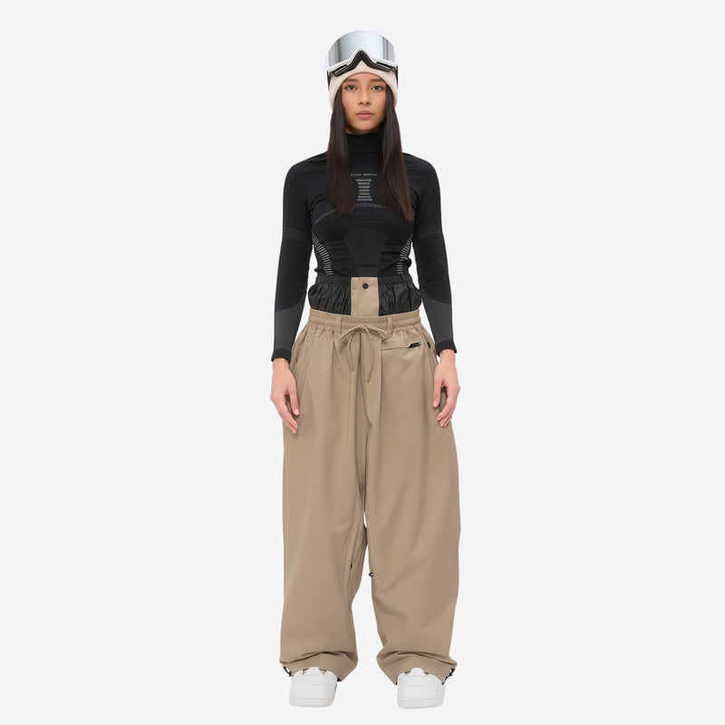 Women's 2-layer snowboard jacket and pants - tan snow pants, on-model front view, for powder days and winter commute