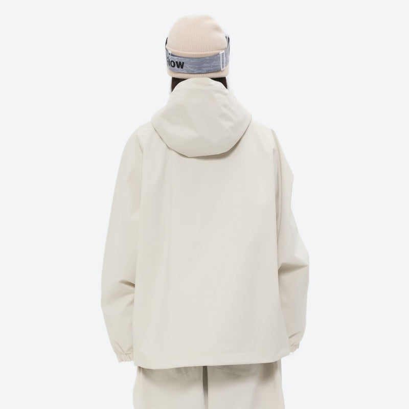 Women's waterproof 2L snow jacket and pants - cream, on-model back hood view, for powder days and winter commute