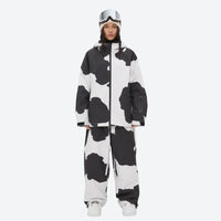 
                  
                    Women's waterproof 2L snow jacket and pants - cow print jacket with cow print pants, for cold-weather winter sports
                  
                