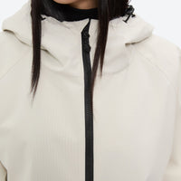 
                  
                    Women's waterproof 2L snow jacket and pants - cream, collar close-up detail, for resort and street wear
                  
                