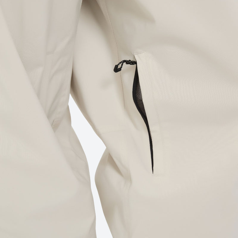 Women's colorblock ski jacket set - cream snow pants, knee zip vent close-up detail, for resort and street wear