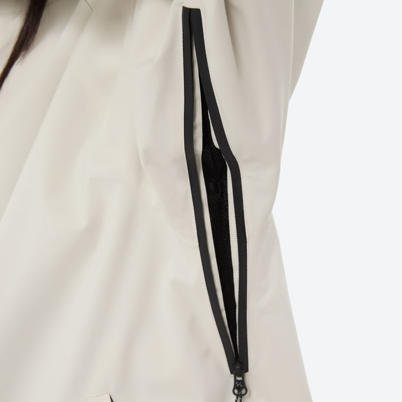 Women's 2-layer snowboard jacket and pants - cream, underarm zip vent close-up detail, for cold-weather winter sports