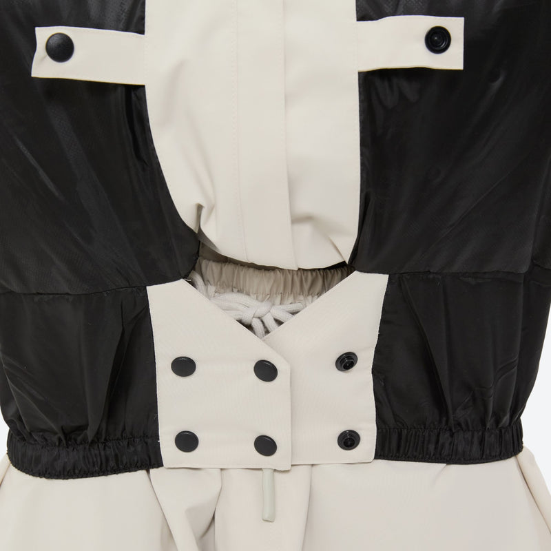 Women's waterproof 2L snow jacket and pants - cream, inner snow skirt close-up detail, for cold-weather winter sports