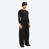 
                  
                    Men's 2-layer snowboard jacket and pants - black snow pants, on-model three-quarter front view, for skiing and snowboarding
                  
                