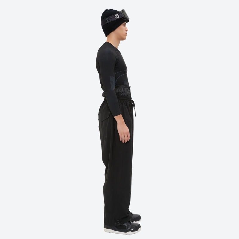Men's waterproof 2L snow jacket and pants - black snow pants, on-model side view, for resort and street wear