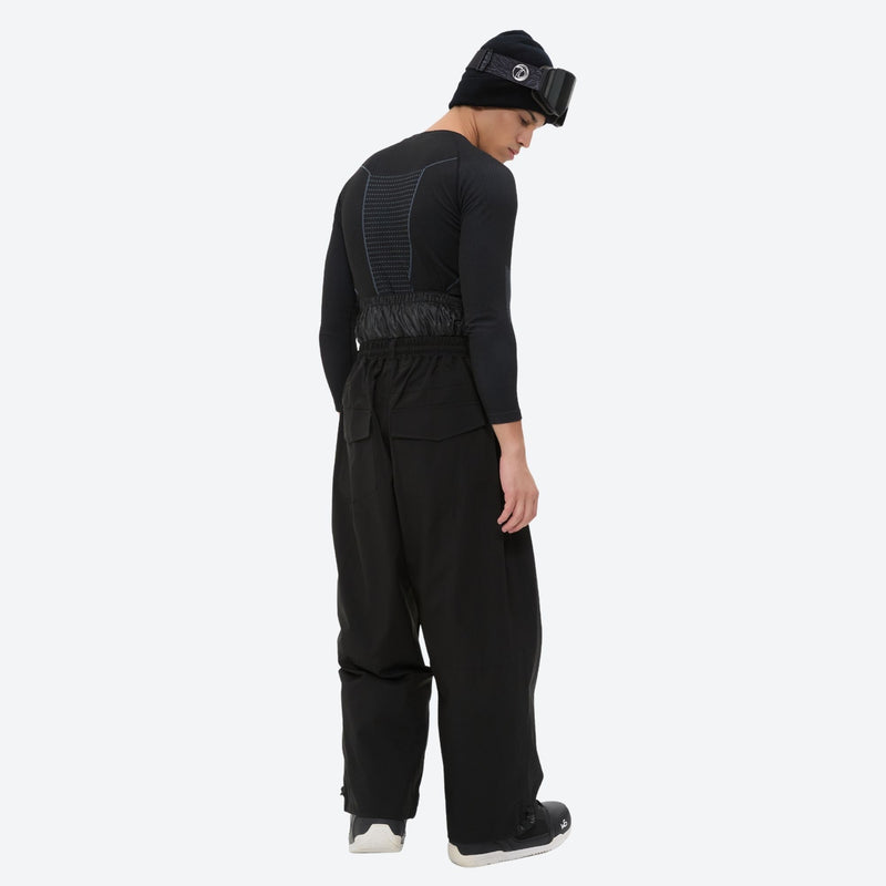 Men's 2-layer snowboard jacket and pants - black snow pants, on-model side view, for cold-weather winter sports