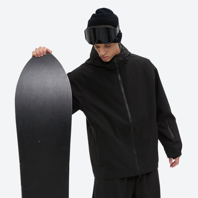 Men's 2-layer snowboard jacket and pants - black, on-model front with upright snowboard, for powder days and winter commute