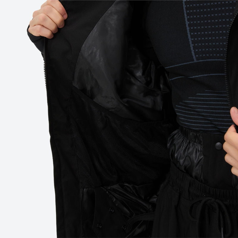 Men's 2-layer snowboard jacket and pants - black, interior lining close-up with hand, for powder days and winter commute