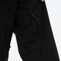 
                  
                    Men's minimalist breathable ski jacket set - black snow pants, thigh zip vent close-up detail, for skiing and snowboarding
                  
                