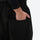 Men's waterproof 2L snow jacket and pants - black snow pants, back pocket close-up with hand, for cold-weather winter sports