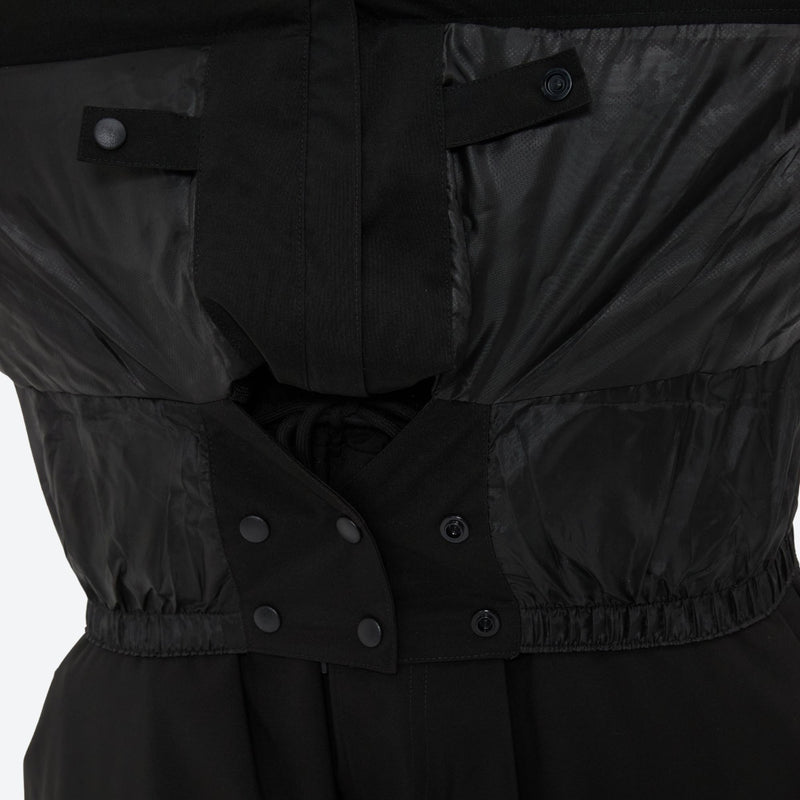 Men's minimalist breathable ski jacket set - black, inner snow skirt close-up detail, for skiing and snowboarding