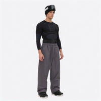 
                  
                    Men's waterproof 2L snow jacket and pants - gray snow pants, on-model three-quarter front view, for resort and street wear
                  
                