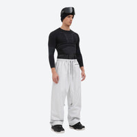
                  
                    Men's waterproof 2L snow jacket and pants - white snow pants, on-model three-quarter front view, for skiing and snowboarding
                  
                