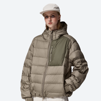 
                  
                    Women's insulated compact down jacket with color-block panel - olive lightweight down hooded jacket on women with cap
                  
                