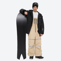 
                  
                    Unisex waterproof 3L bib snow pants - black jacket with tan bib pants, for powder days and winter commute
                  
                