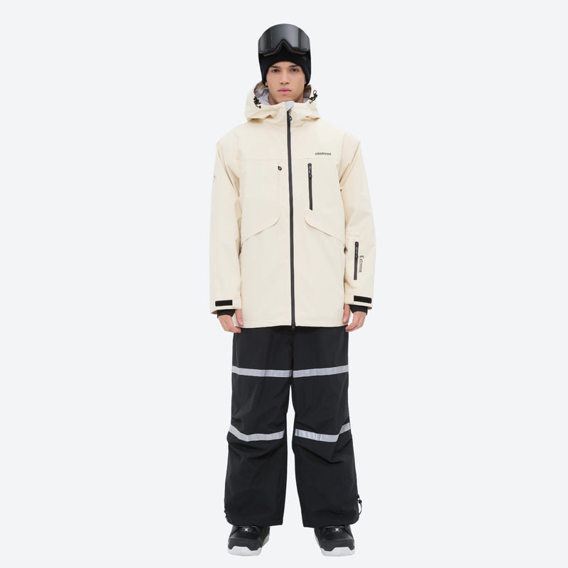 Unisex snowboard bib pants - cream jacket with black bib pants, on-model full-body front view, for resort and street wear