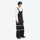 Unisex waterproof 3L bib snow pants - black bib pants with white top, on-model front view, for resort and street wear
