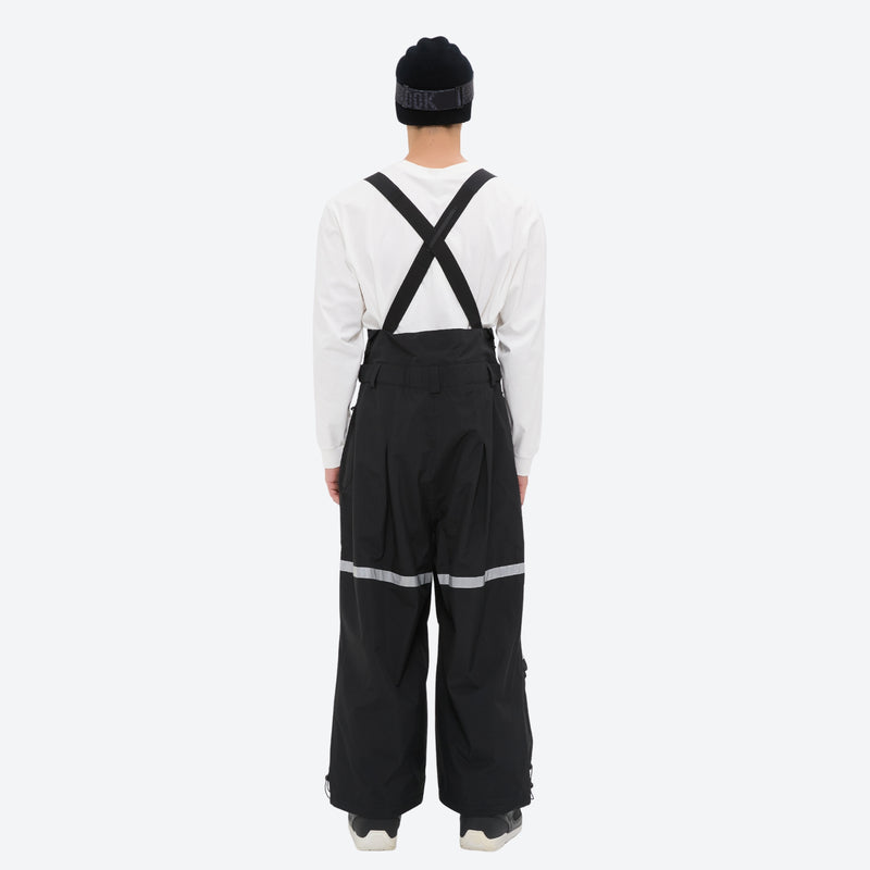 Unisex waterproof 3L bib snow pants - black bib pants with white top, on-model back view, for skiing and snowboarding