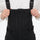 Unisex waterproof 3L bib snow pants - black bib pants, bib chest zip close-up with hand, for cold-weather winter sports