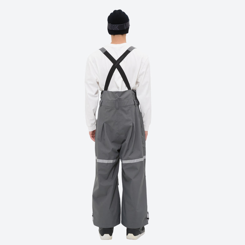 Unisex waterproof 3L bib snow pants - gray bib pants with white top, on-model back view, for resort and street wear
