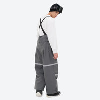 
                  
                    Breathable 3-layer suspender bibs with reflective trim - gray bib pants with white top, for powder days and winter commute
                  
                