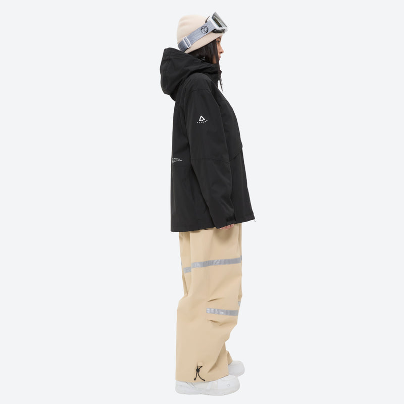 Women's reflective trim ski jacket with suspender bibs - black jacket with tan bib pants, for resort and street wear