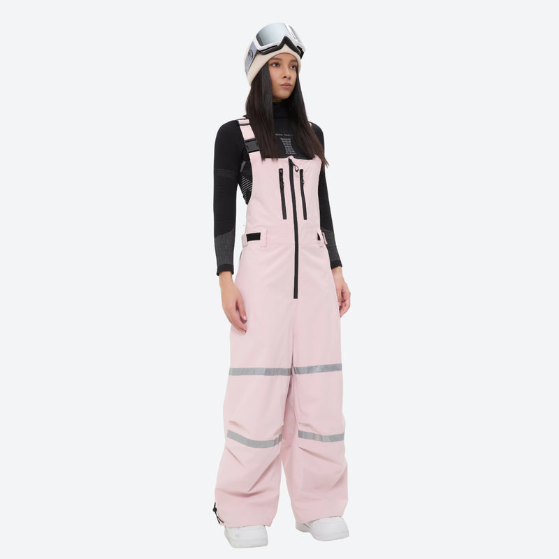 Unisex waterproof 3L bib snow pants - pink bib pants with black top, on-model front view, for resort and street wear