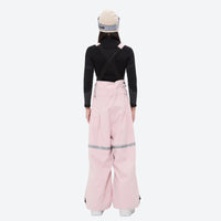 
                  
                    Unisex waterproof 3L bib snow pants - pink bib pants with black top, on-model back view, for skiing and snowboarding
                  
                