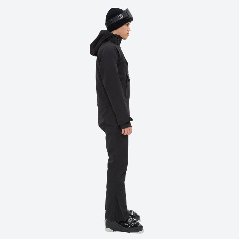 Men's waterproof 2L one-piece snow suit - black one-piece snow suit, on-model side view, for cold-weather winter sports