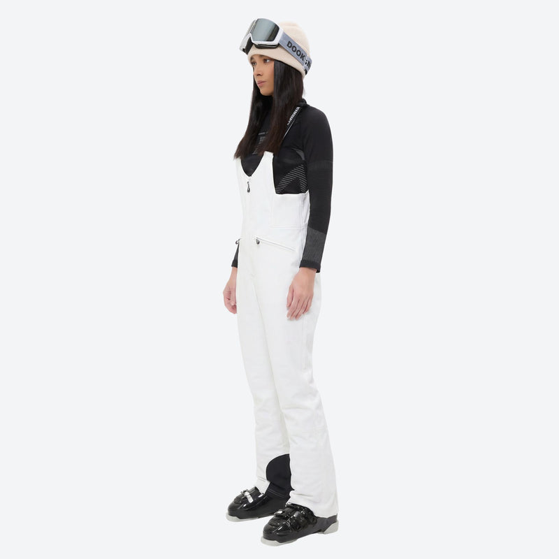 Women's fur trim hood snow jacket with suspender bibs - white bib pants, for snowy mountain travel