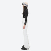 
                  
                    Women's 3-layer breathable ski suit set - white bib pants, on-model side view, for skiing and snowboarding
                  
                