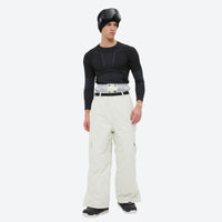 
                  
                    Unisex waterproof 3L snow jacket and pants series - white snow pants, on-model front view, for cold-weather winter sports
                  
                