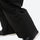 Men's breathable half-zip ski pullover set - black snow pants, hem over shoe close-up detail, for cold-weather winter sports