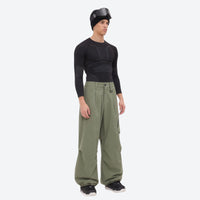 
                  
                    Men's 3-layer snowboard jacket and wide-leg pants - sage green snow pants with black top, for resort and street wear
                  
                