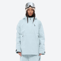 
                  
                    Women's breathable ski pullover set - ice blue, on-model front with goggles on head, for resort and backcountry days
                  
                