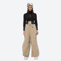 
                  
                    Women's 3-layer snowboard anorak and pants - tan snow pants, on-model front view, for skiing and snowboarding
                  
                