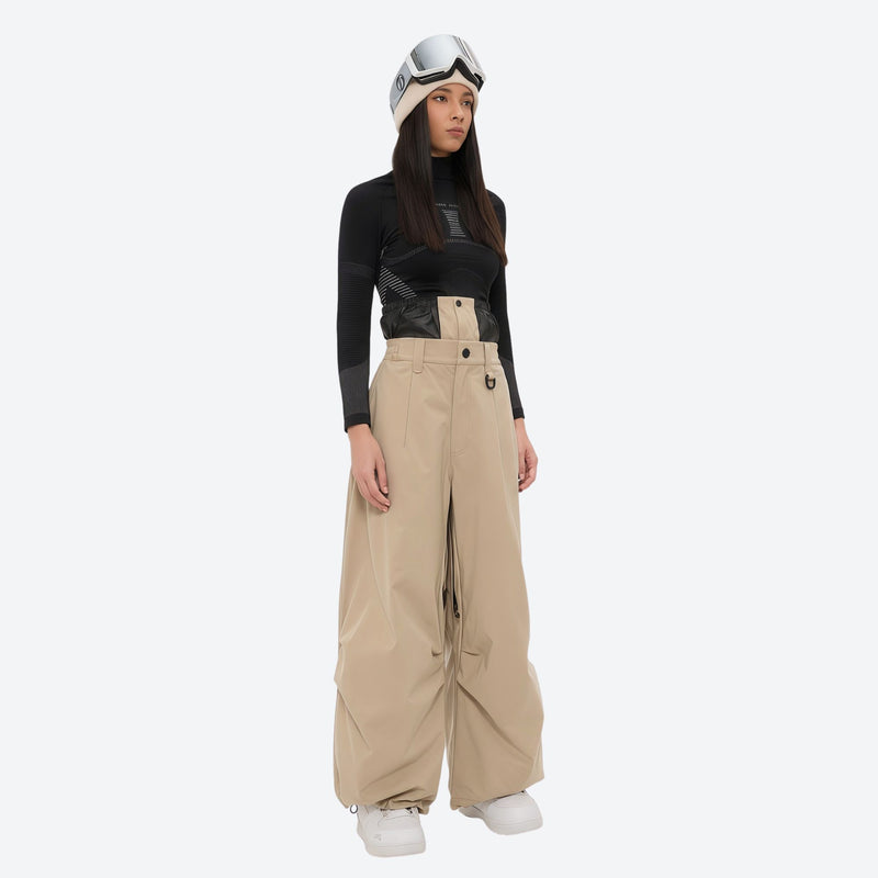 Women's 3-layer snowboard anorak and pants - tan snow pants, on-model front view, for resort and backcountry days