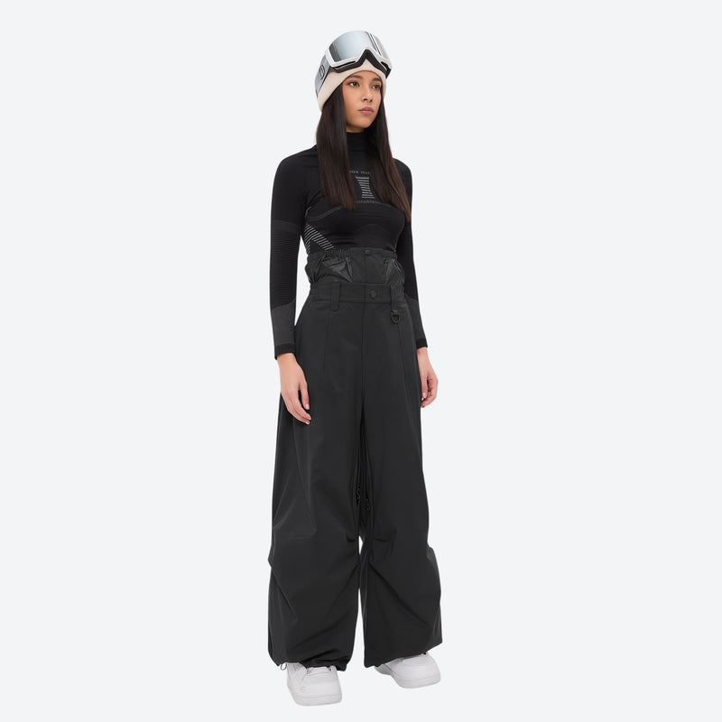 Women's 3-layer snowboard anorak and pants - black snow pants, on-model front view, for skiing and snowboarding