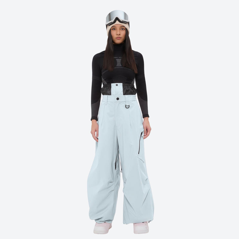 Women's 3-layer snowboard anorak and pants - ice blue snow pants, on-model front view, for skiing and snowboarding