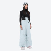 
                  
                    Women's waterproof 3L anorak snow jacket and pants - ice blue snow pants, for resort and backcountry days
                  
                