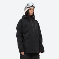 
                  
                    Women's 3-layer snowboard anorak and pants - black, on-model three-quarter front view, for resort and backcountry days
                  
                