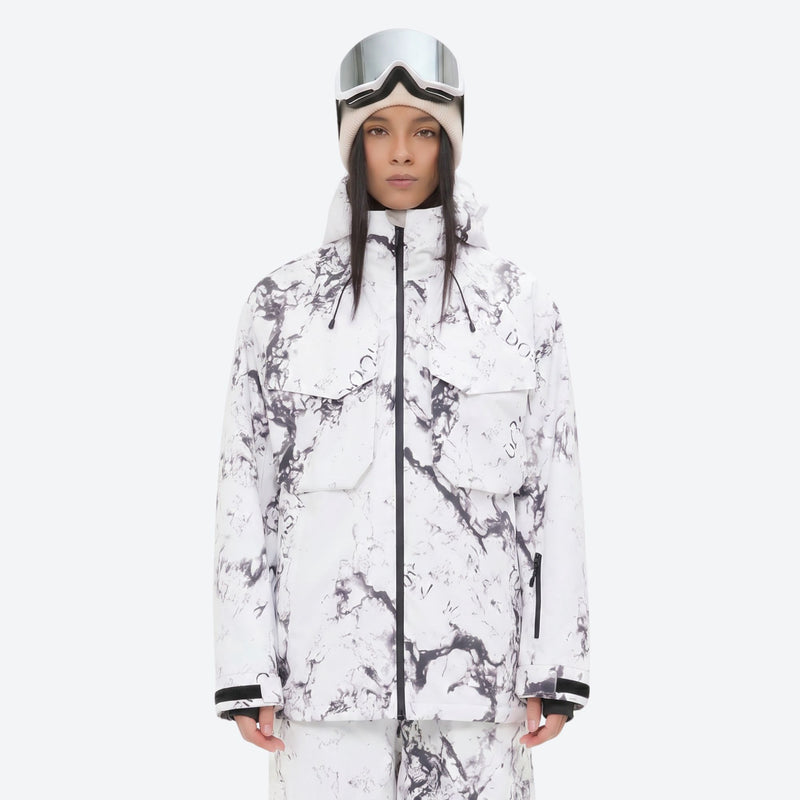 Women's 3-layer snowboard jacket and pants - white marble print jacket, on-model front view, for resort and backcountry days