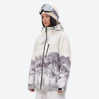 
                  
                    Women's 3-layer snowboard jacket and pants - white mountain print jacket, for cold-weather winter sports
                  
                