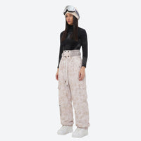 
                  
                    Unisex waterproof 3L snow jacket and bib pants series - cream tan marble print bib pants, for resort and backcountry days
                  
                
