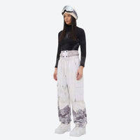 
                  
                    Women's breathable printed ski jacket set - white mountain print snow pants with black top, for resort and backcountry days
                  
                