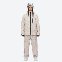 
                  
                    Unisex printed snowboard jacket and bibs - cream tan marble print suit, for cold-weather winter sports
                  
                